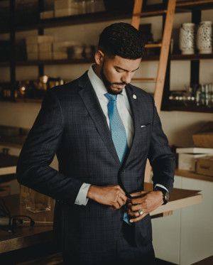 business man buttoning jacket